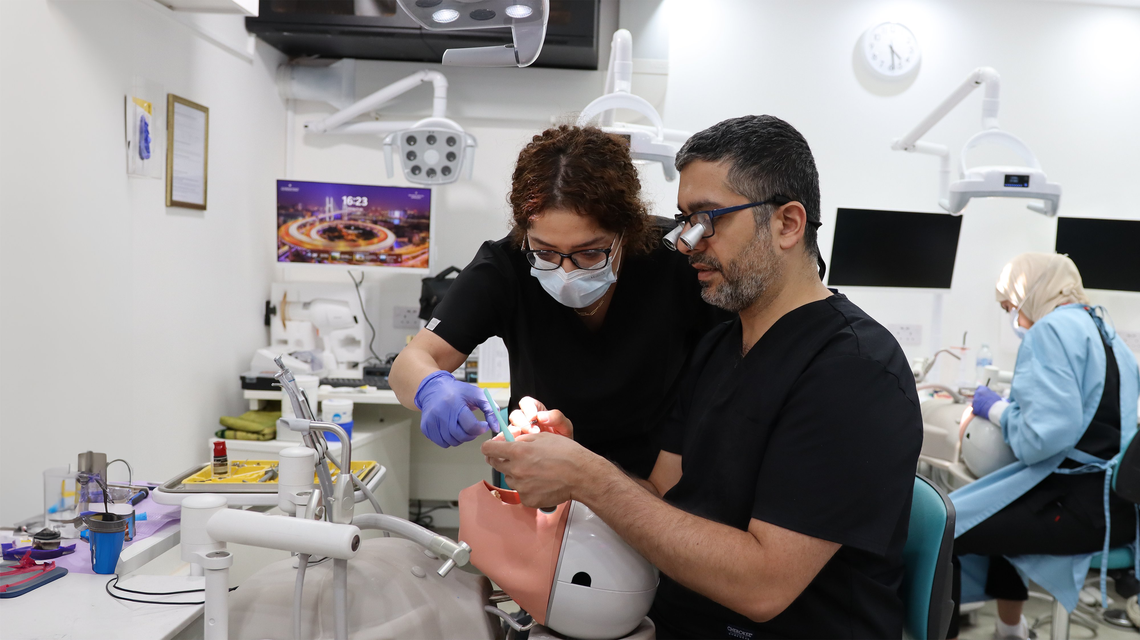 Dental professionals working in clinic